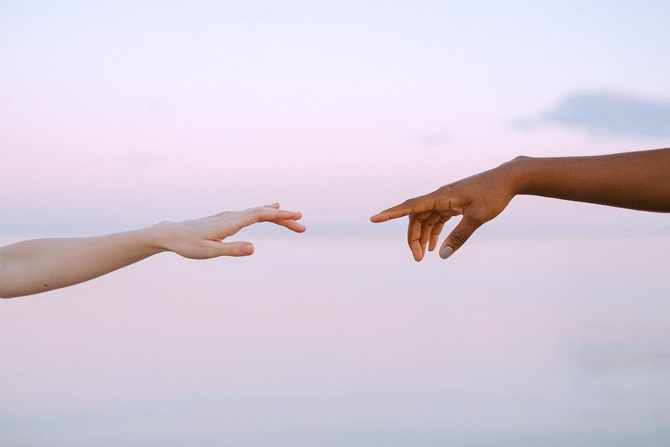 Image representing the importance of inclusion for individuals with ASD, showing diverse individuals holding hands and forming a circle to symbolize unity and acceptance