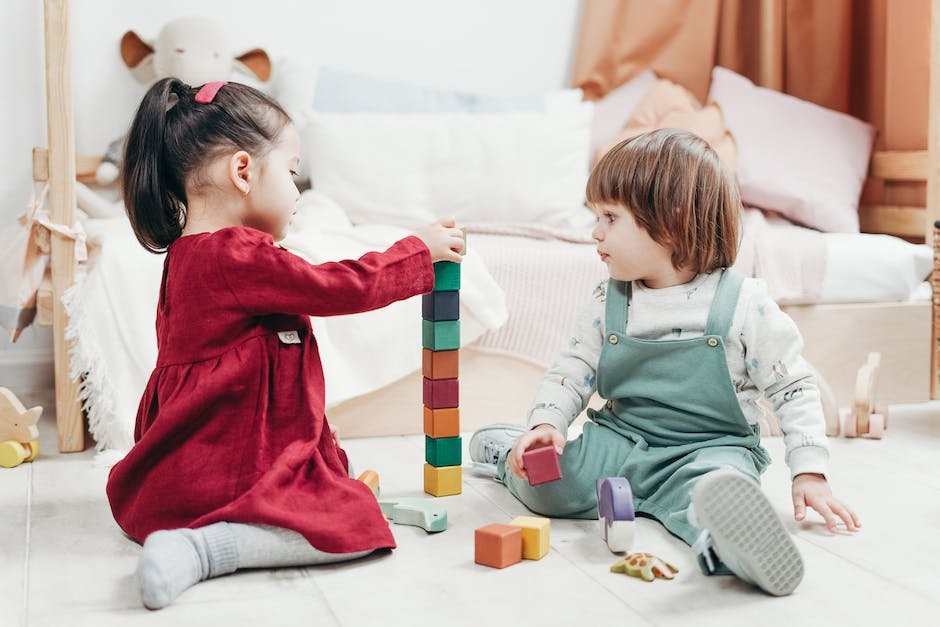 Image depicting a child with autism happily playing with toys.