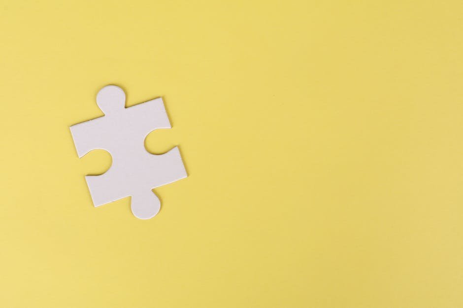 Image depicting a child with autism spectrum disorder holding a puzzle piece, symbolizing the need for a holistic approach to managing energy levels in autistic children