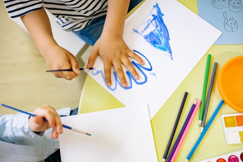 A child drawing with vibrant colors