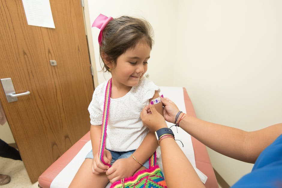 An image depicting a child receiving a measles, mumps, and rubella vaccination, showing the importance of vaccination for child health and community protection.
