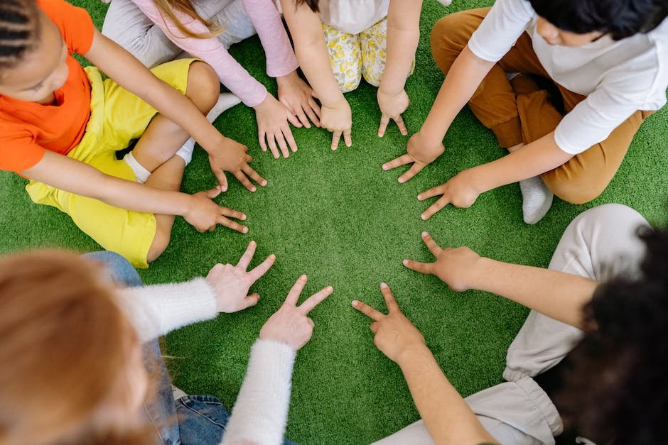 A group of children on a playground, symbolizing the importance of professional assistance and therapies in school integration for autistic kids.