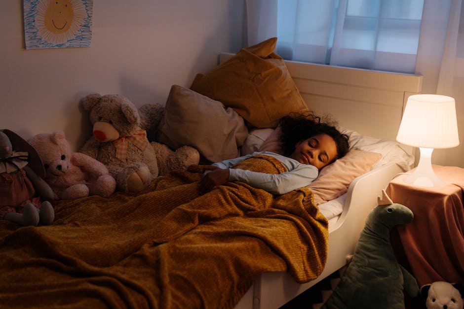 A young child sleeping peacefully in bed