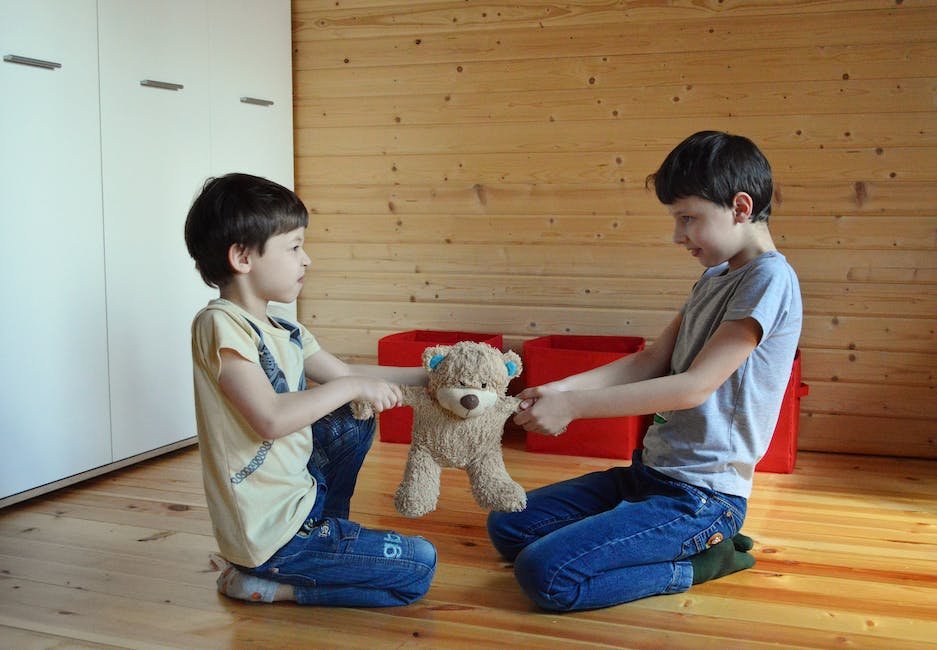 Image illustrating understanding physical aggression in children with autism or ADHD, depicting a child holding their head in frustration.