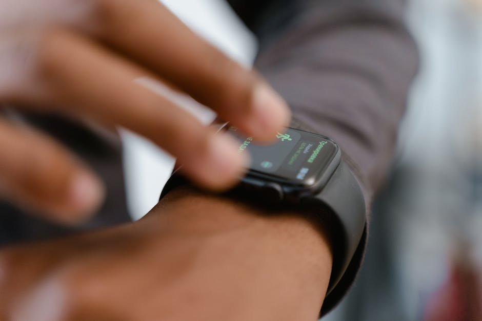 Image description: An image showing a child with autism wearing a smartwatch with a GPS tracker.