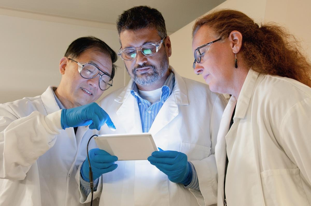 Image of a researcher holding a magnifying glass, symbolizing the search for truth and debunking myths in autism and vaccines