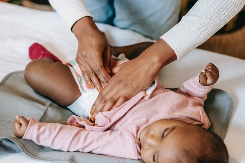 Image of a physical therapist working with a child with autism, helping improve their motor skills and overall development.