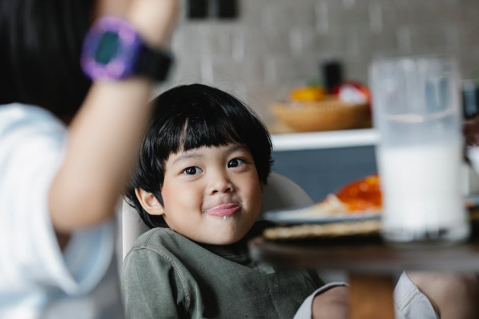 Illustration of a child enjoying a meal with a smile on their face